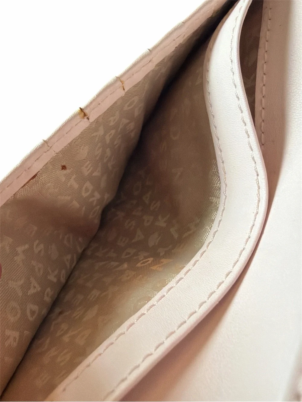 kate spade Pale Pink Bow Accent Continental Wallet